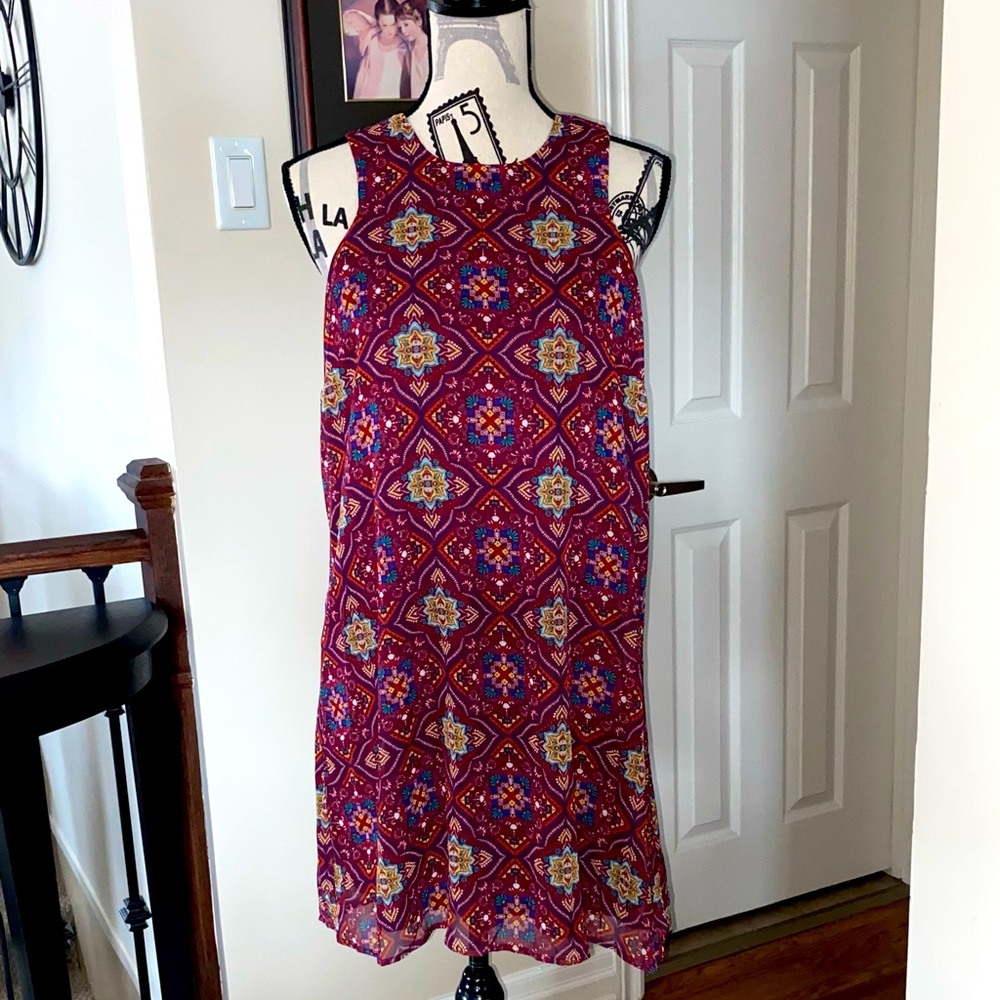 New sleeveless dress size large. Sheer top with liner